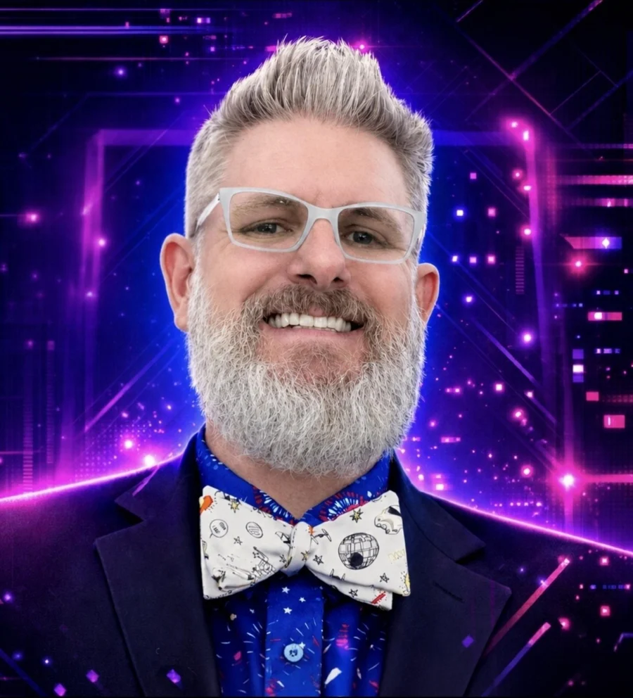 Rob Whetstine wearing white glasses and a Star Wars bowtie against a purple and blue background.